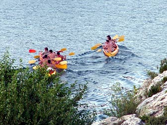 Canoe and bathing in the Gardon river at the Pont du Gard